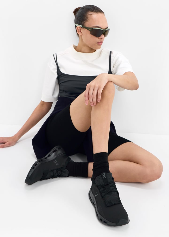 On All-Black Low-Top Sneakers with Cutout Sole