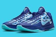 Nike Navy Low-Top Sneakers with Light Blue & Teal Accents